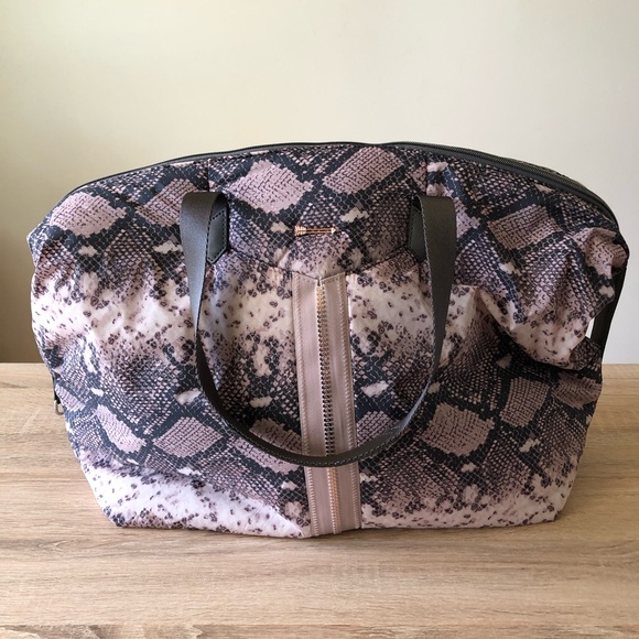 Stella & Dot Handbags - Stella & Dot Crush It Carry On Blush Snake Print